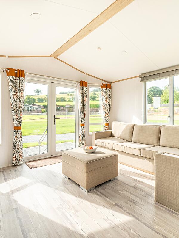 Atlas Style caravan holiday home for sale on 5 star caravan park in Wales - lounge photo