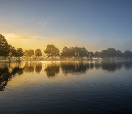 Misty Autumn sunrise over Pearl Lake