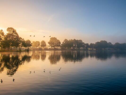 Misty Autumn sunrise over Pearl Lake