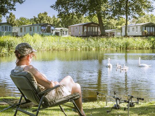 Caravan holiday park with fishing and swans 5 star