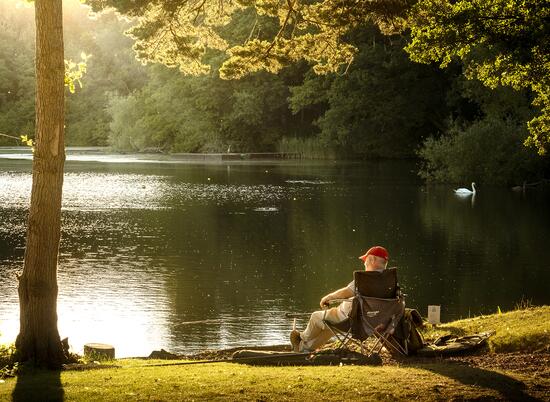 Sunset fishing at tranquil Pearl Lake holiday park