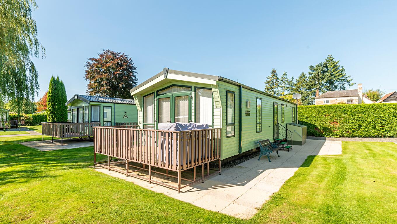 Atlas Status holiday home for sale on 5 star caravan park with fishing lake