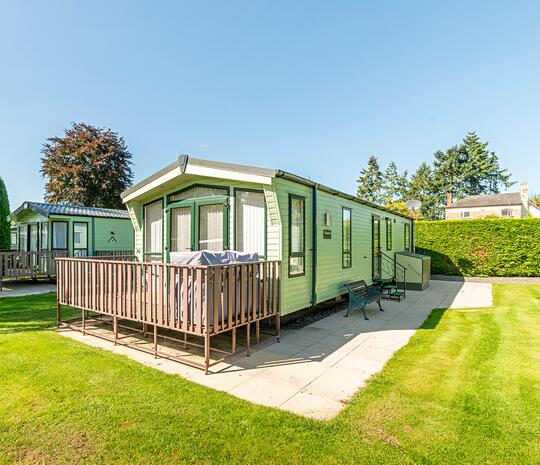 Atlas Status holiday home for sale on 5 star caravan park with fishing lake