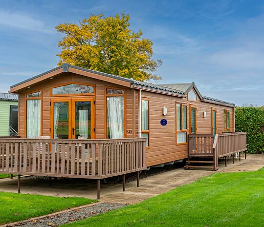 Pre-owned Pemberton Serena static caravan for sale 5 star caravan holiday park. Exterior photo