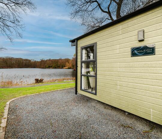 Regal Cranleigh Lodge holiday home for sale at Pearl Lake Country Holiday Park. Lake edge plot photo