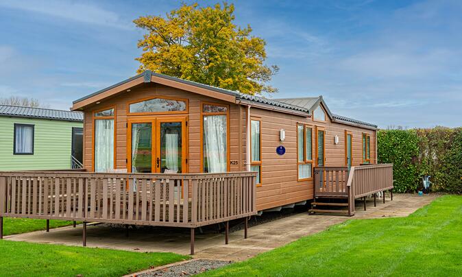 Pre-owned Pemberton Serena static caravan for sale 5 star caravan holiday park. Exterior photo