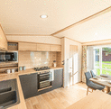 ABI Langdale Holiday Home for sale on 5 star riverside holiday park. Kitchen dining area photo