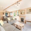 ABI Windermere Holiday Home for sale on 5 star riverside holiday park. Living area photo