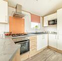 Atlas Style caravan holiday home for sale on 5 star caravan park in Wales - kitchen photo