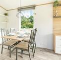 Atlas Style caravan holiday home for sale on 5 star caravan park in Wales - dining area photo