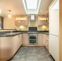 Regal Autograph holiday home for sale on 5 star caravan park with bar restaurant. Kitchen photo