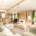 Regal Autograph holiday home for sale on 5 star caravan park with bar restaurant. Lounge photo