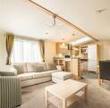 Regal Autograph holiday home for sale on 5 star caravan park with bar restaurant. Lounge photo