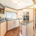 Atlas Status caravan holiday home for sale on 5 star caravan park with fishing - kitchen photo