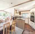 Atlas Status caravan holiday home for sale on 5 star caravan park with fishing - living area photo