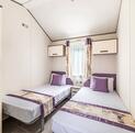 Atlas Ovation Lodge caravan holiday home for sale on 5 star caravan park with fishing - second bedroom photo