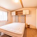 ABI Oakley caravan Holiday Home for sale on 5 star riverside holiday park. Main bedroom photo