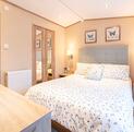 Pemberton Serena caravan holiday home for sale on 5 star caravan park. Main bedroom photo