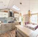 Atlas Ovation Lodge caravan holiday home for sale on 5 star caravan park with fishing - kitchen dining area photo