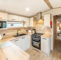 Static caravan holidays - kitchen dining area (Heron)