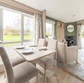 ABI Langdale Holiday Home for sale on 5 star lakeside holiday park. Dining area photo