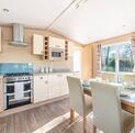 Regal Harlington caravan holiday home for sale on 5 star static caravan holiday park. Kitchen dining area photo