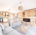 Regal Harlington caravan holiday home for sale on 5 star park dog friendly and clubhouse. Lounge photo