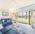 Willerby Vogue Nouveau for sale on lake edge pitch at 5 star caravan holiday park. Lounge photo