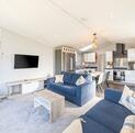 Willerby Vogue Nouveau for sale on lake edge pitch at 5 star caravan holiday park. Lounge photo