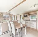 ABI Beaumont for sale on Lake view plot at Pearl Lake Country Holiday Park. Kitchen dining area photo